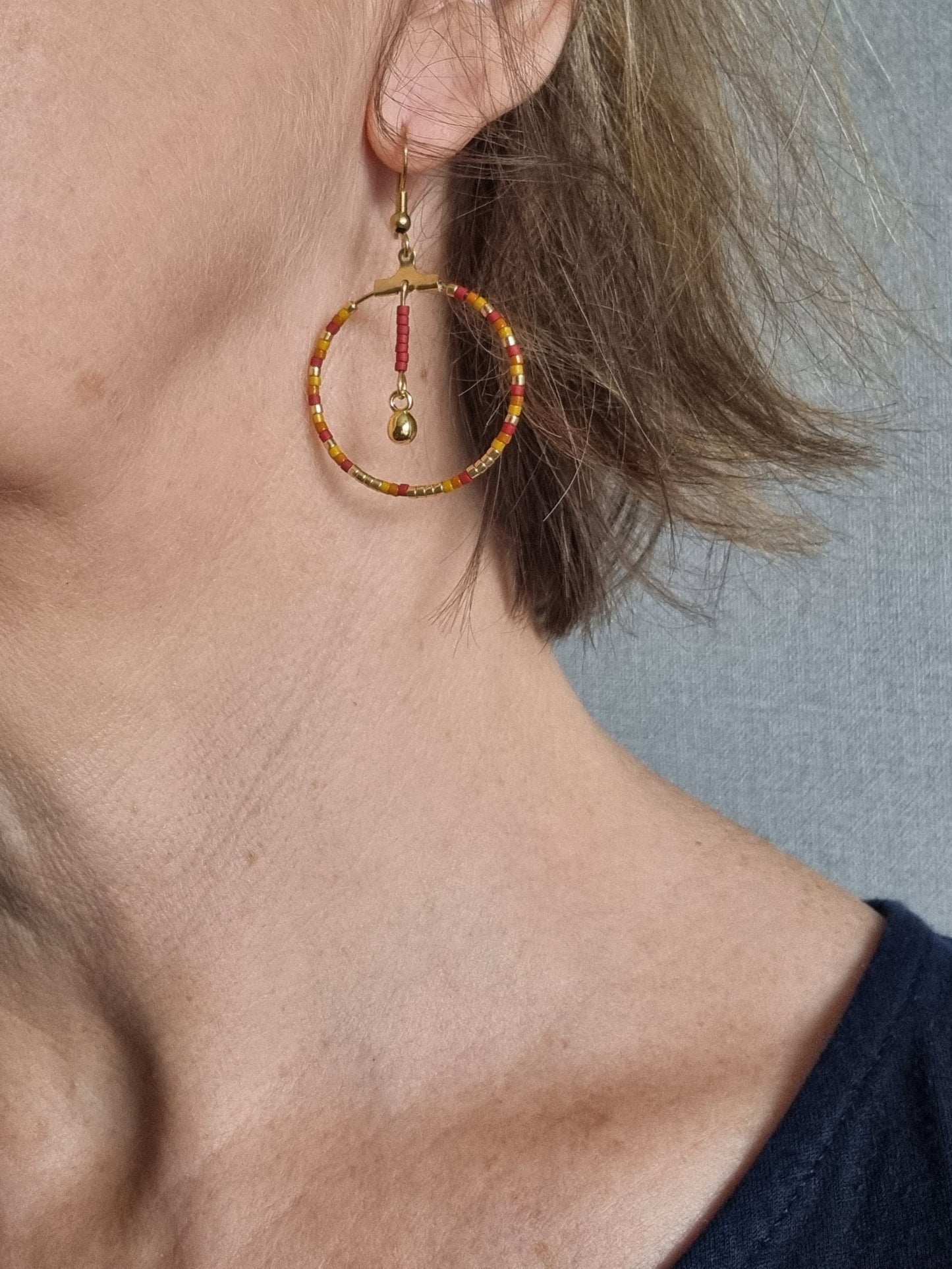 Boucles d'oreilles pendantes créoles acier doré ANJALI
