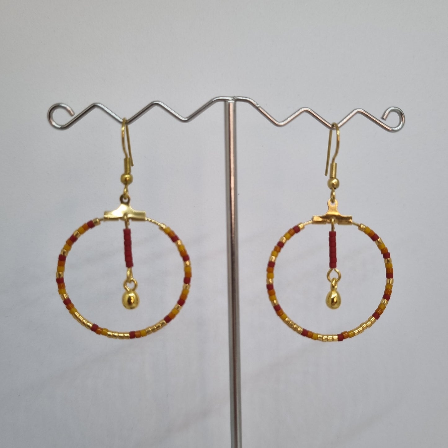 Boucles d'oreilles pendantes créoles acier doré ANJALI