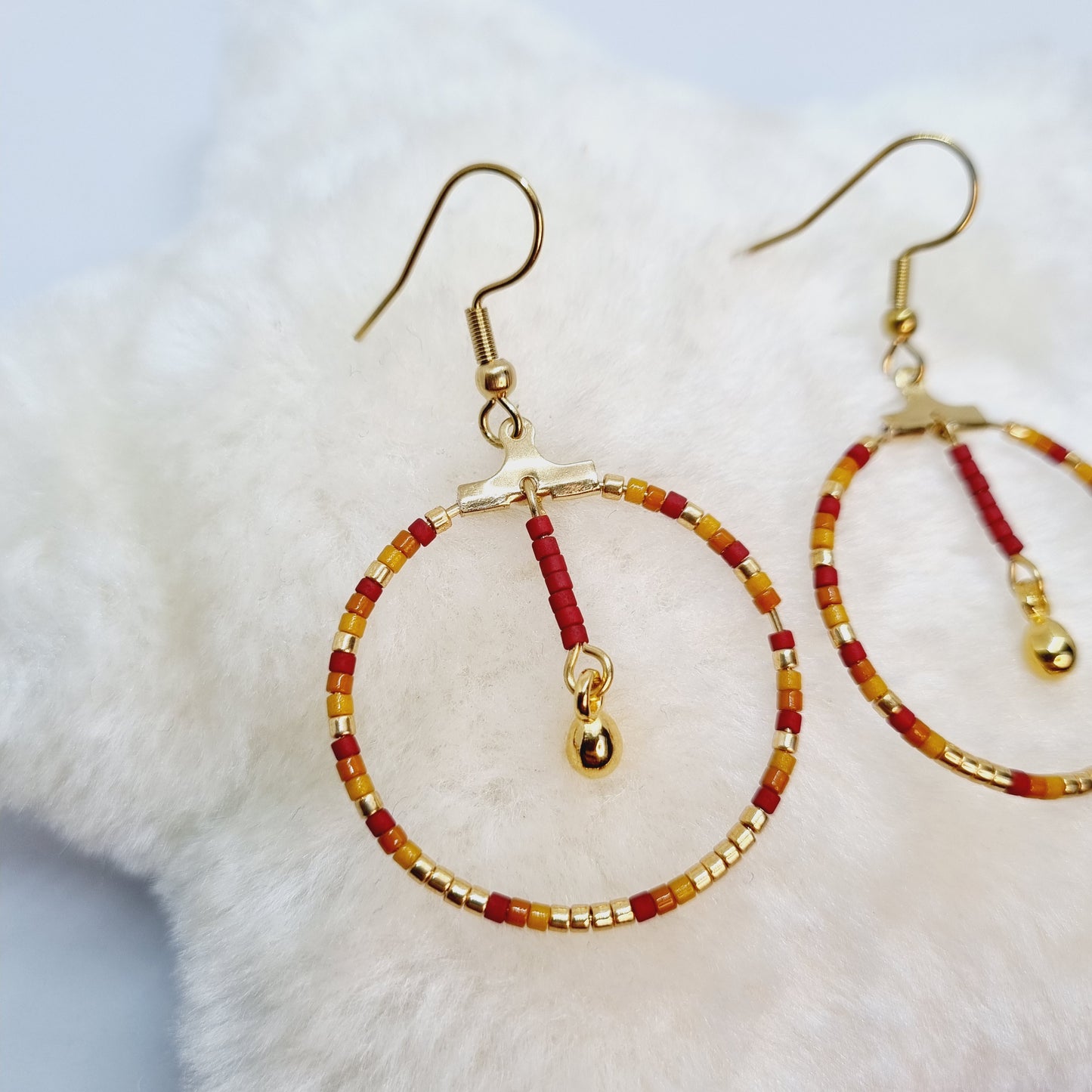 Boucles d'oreilles pendantes créoles acier doré ANJALI