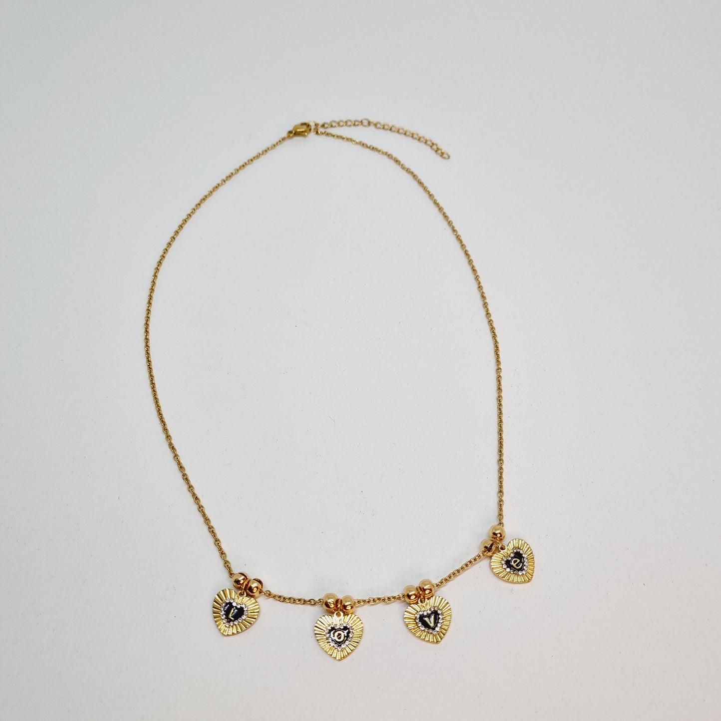 Collier chaîne acier doré message L.O.V.E.