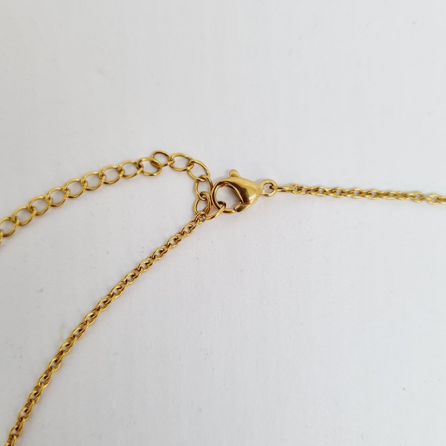 Collier pendentif turquoise acier doré GLORIA