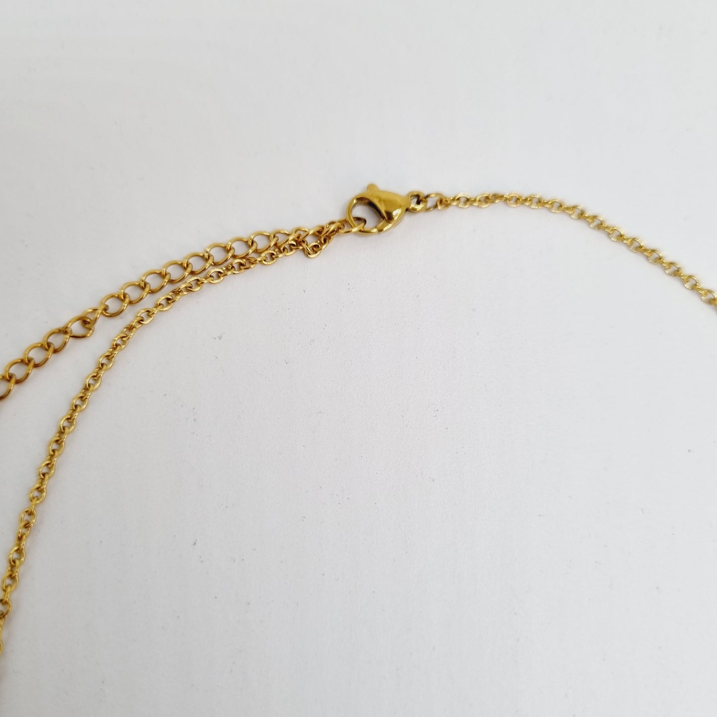 Collier chaîne acier doré pendentif éventail résine et plaqué or TALLULAH