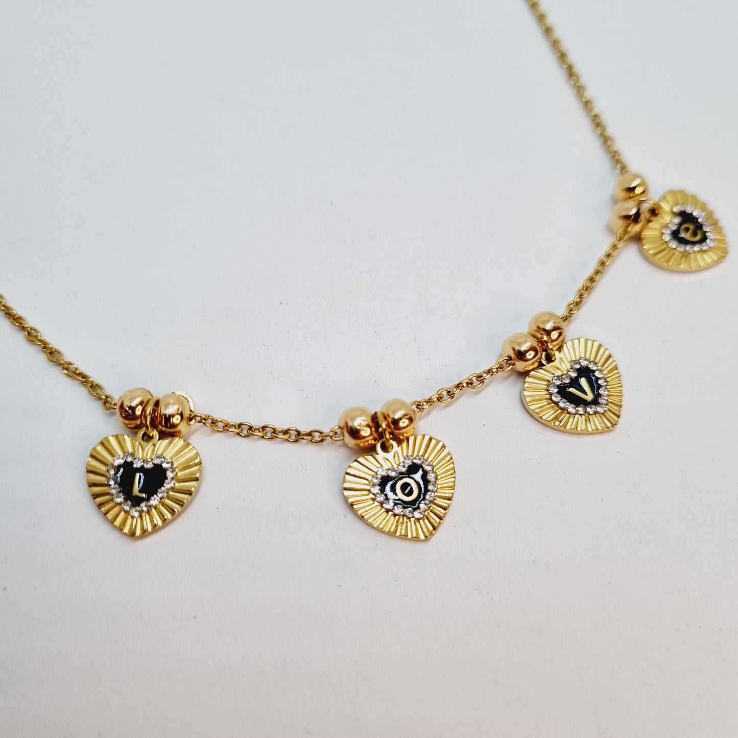 Collier chaîne acier doré message L.O.V.E.