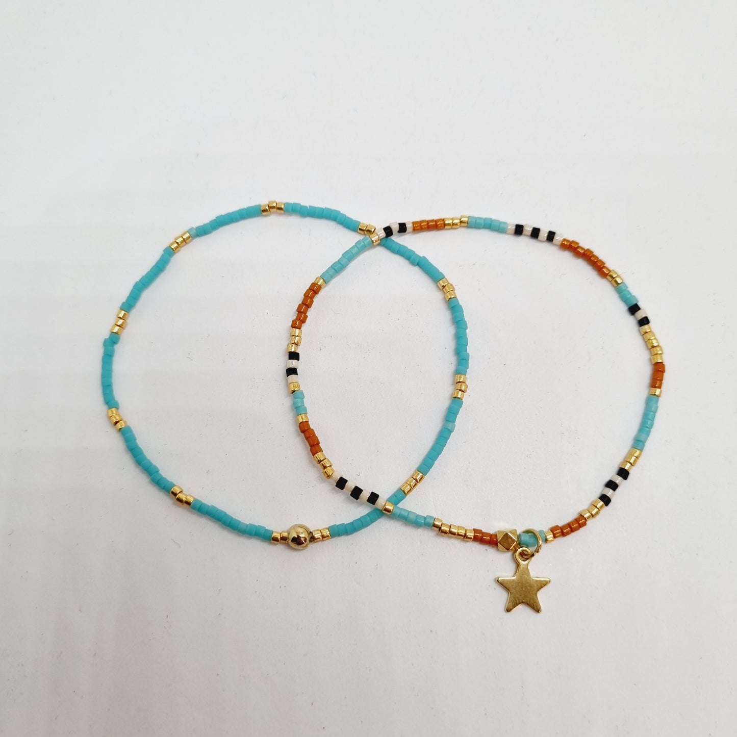 Bracelet double perles fines et étoile acier doré COSMOS