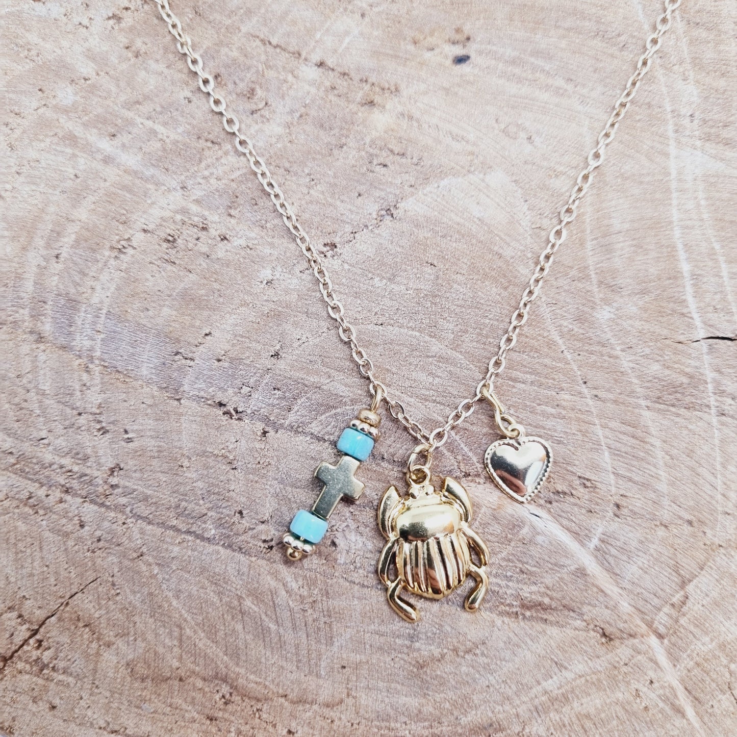Collier acier doré scarabée KABUTO