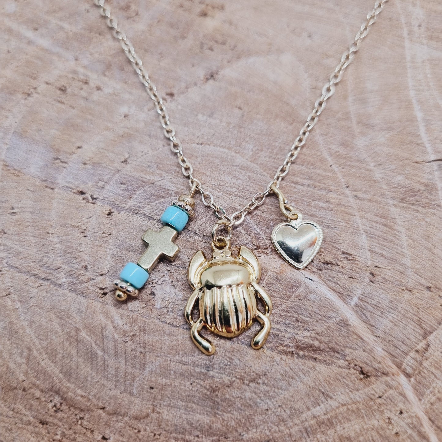 Collier acier doré scarabée KABUTO