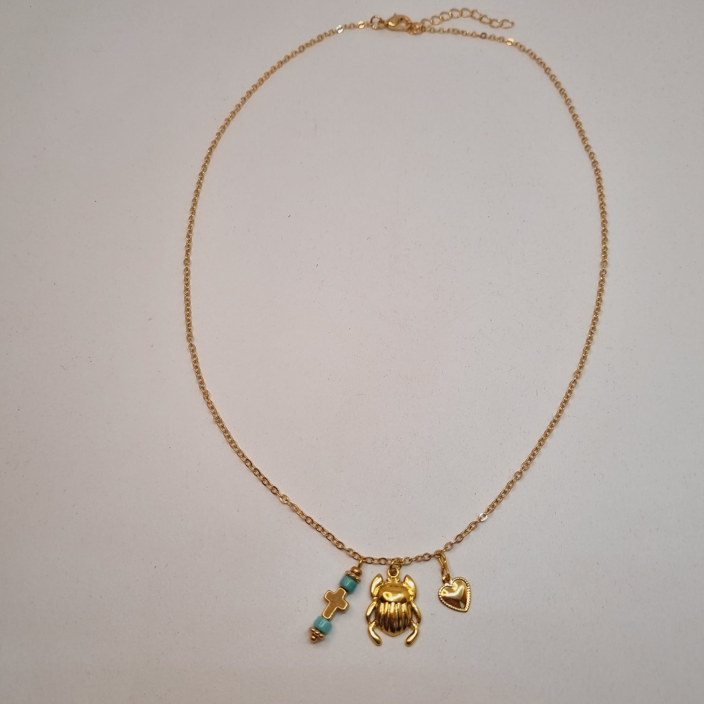 Collier acier doré scarabée KABUTO
