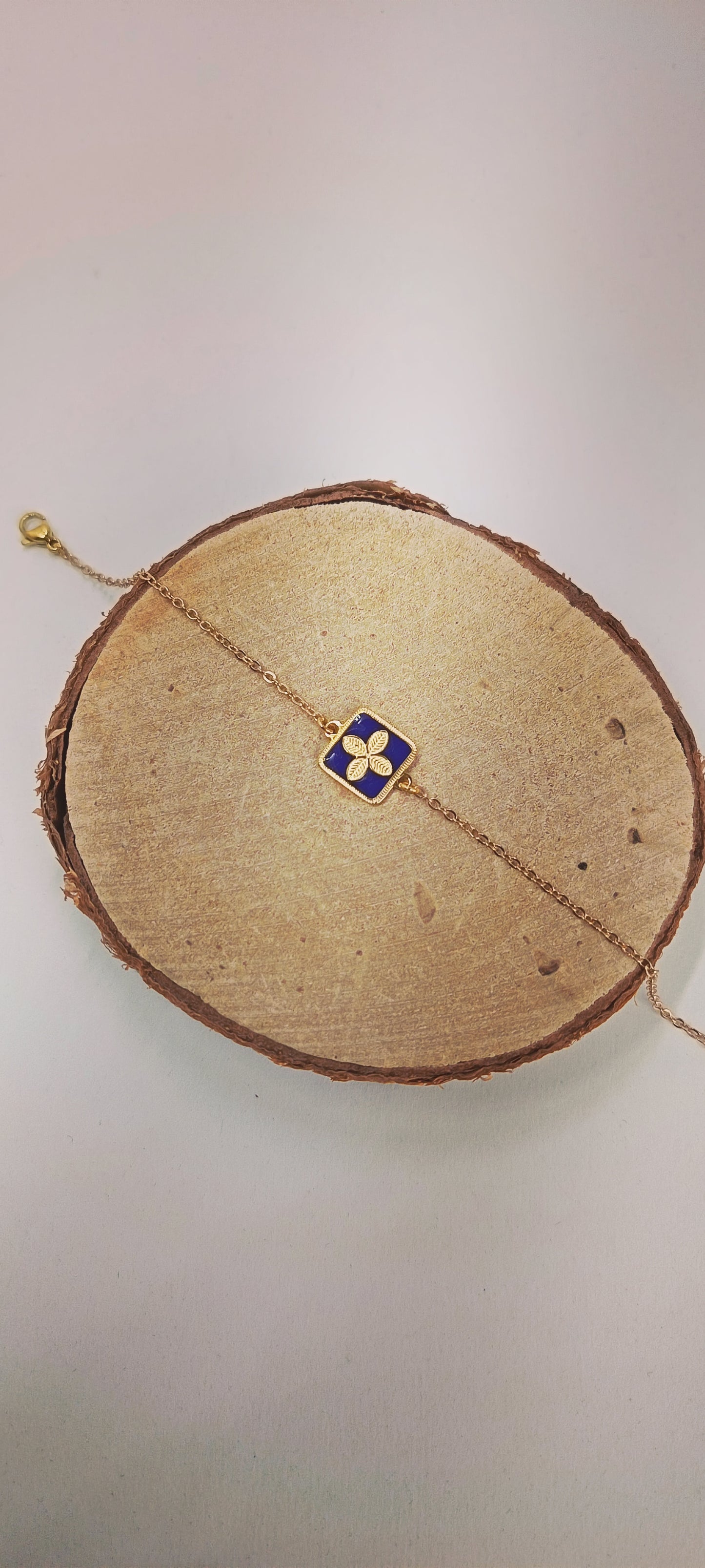 Bracelet chaîne acier médaillon fleur bleu et or SOLENE
