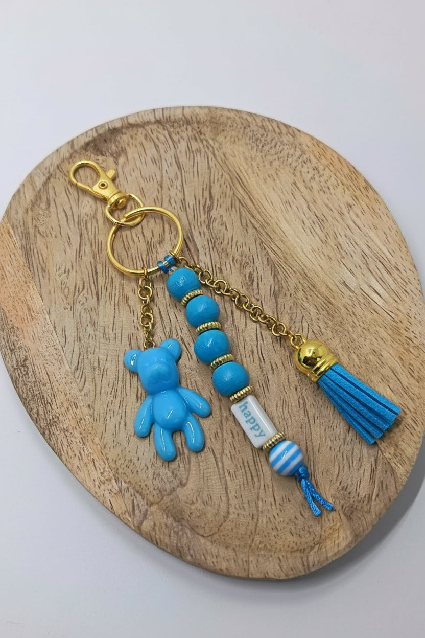 Bijou de sac porte clé bleu et doré Happy Teddy
