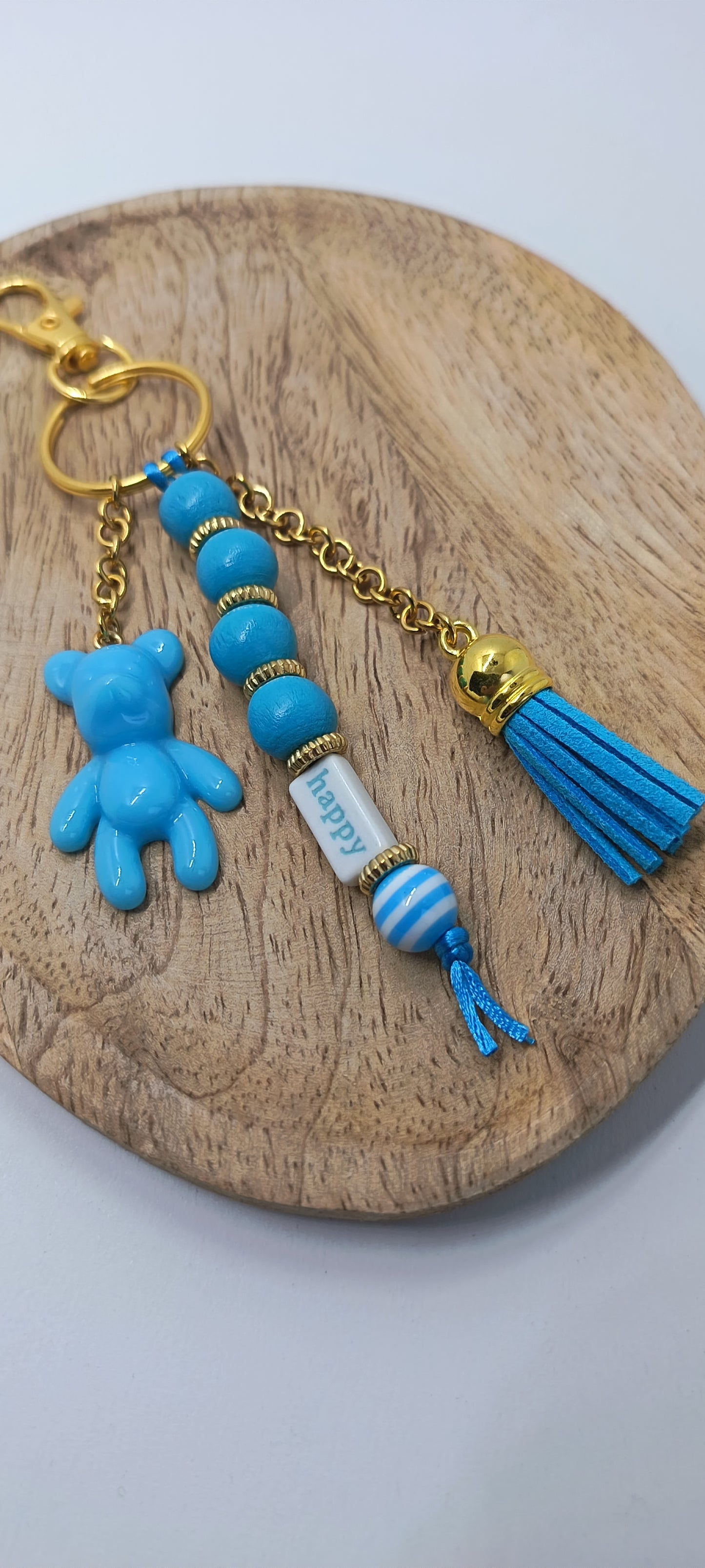 Bijou de sac porte clé bleu et doré Happy Teddy