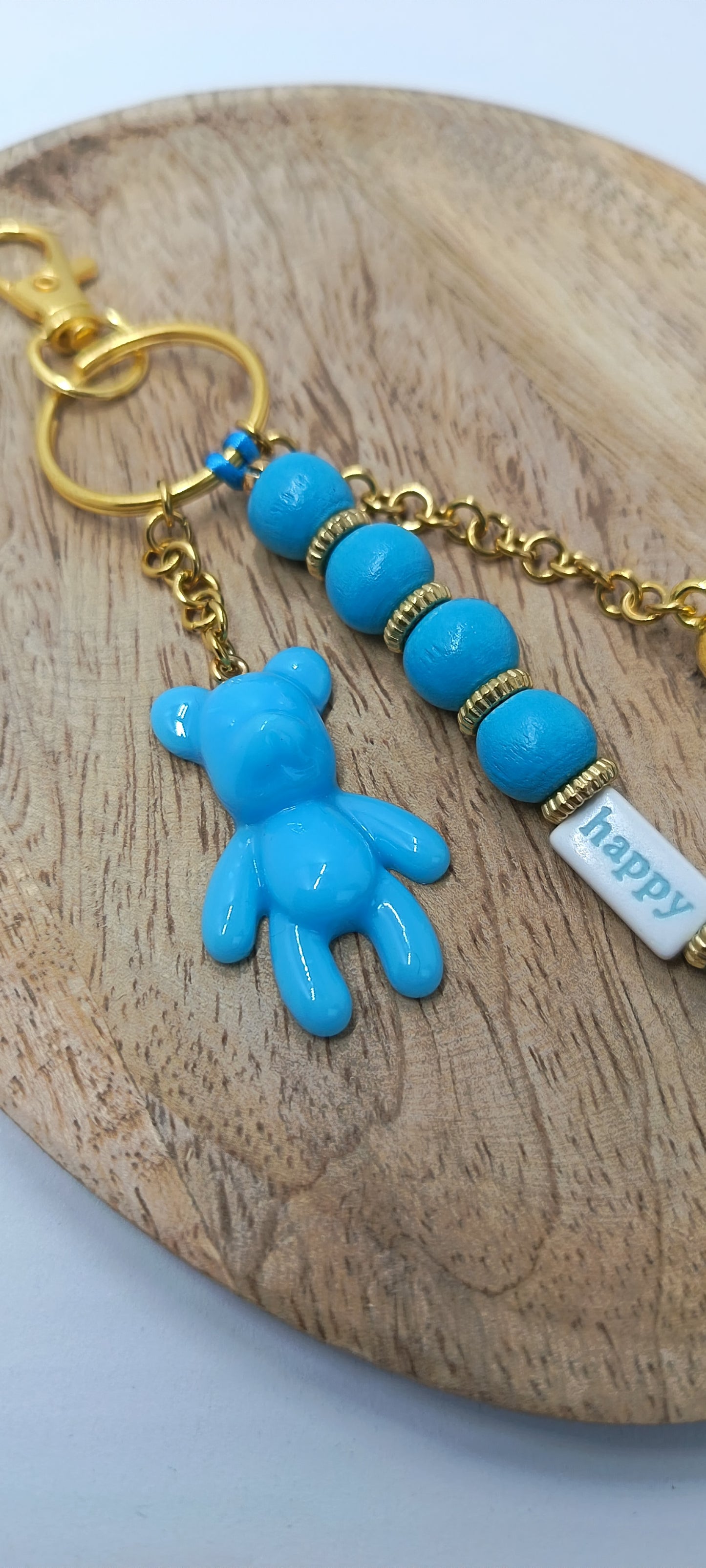 Bijou de sac porte clé bleu et doré Happy Teddy